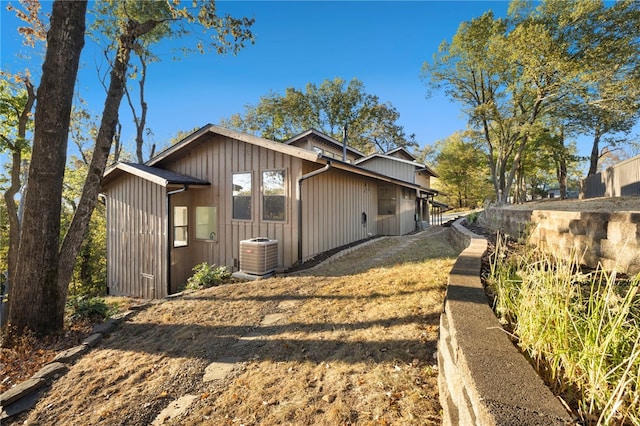 view of side of property featuring cooling unit