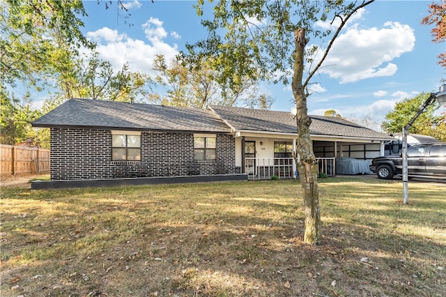 ranch-style house with a front yard