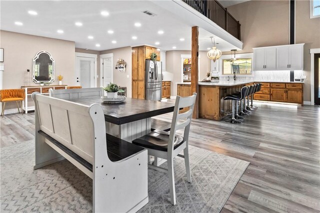 13136 Cedar Grove Rd, Lead Hill, AR 72644 - dining space with recessed lighting, light wood finished floors, and visible vents