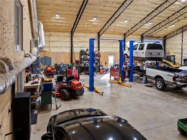 13136 Cedar Grove Rd, Lead Hill, AR 72644 - garage featuring a workshop area