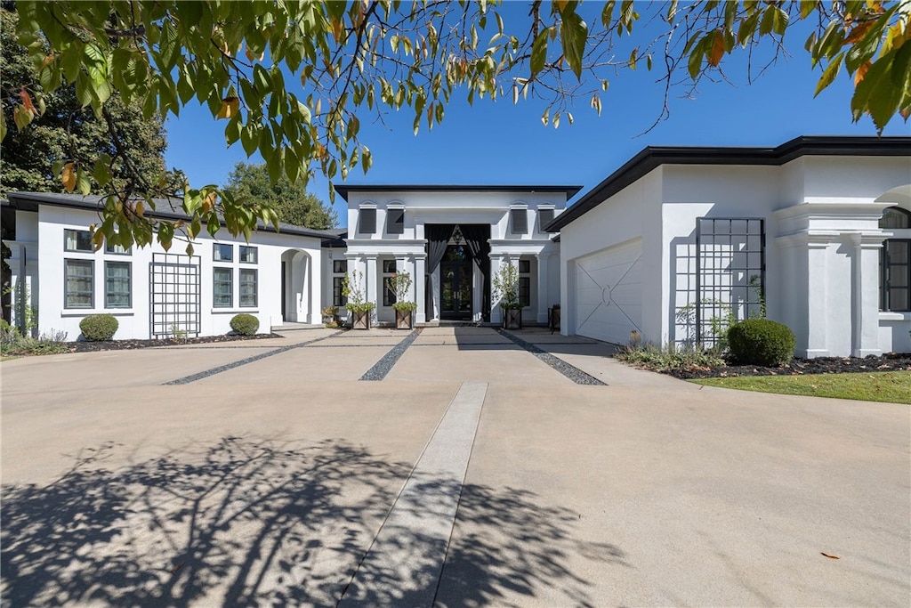 view of front of property with a garage