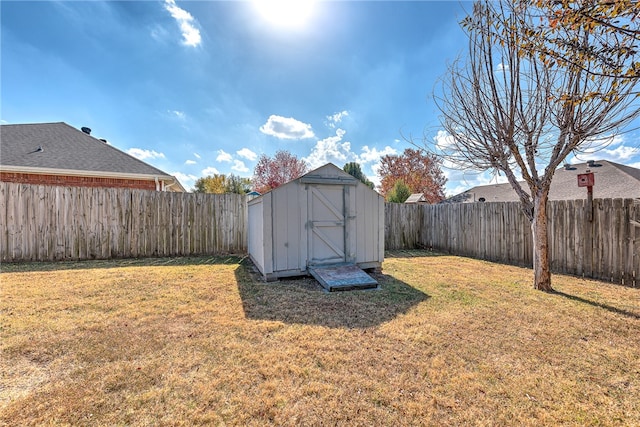 view of outbuilding with a yard