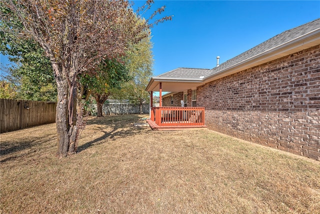 view of yard with a deck