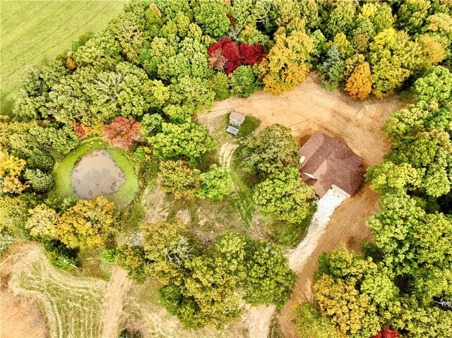 birds eye view of property featuring a rural view