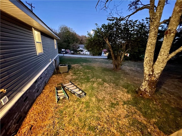 view of yard featuring central AC