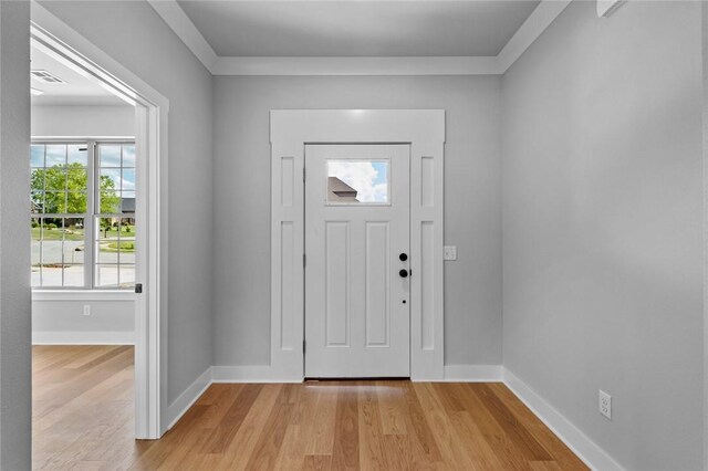 825 Baker St, Pea Ridge, AR 72751 - entrance foyer featuring visible vents, baseboards, and light wood-type flooring
