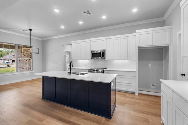 825 Baker St, Pea Ridge, AR 72751 - kitchen featuring decorative backsplash, appliances with stainless steel finishes, crown molding, and a sink