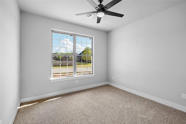 825 Baker St, Pea Ridge, AR 72751 - carpeted spare room featuring visible vents, ceiling fan, and baseboards