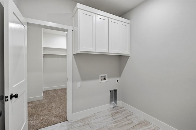 825 Baker St, Pea Ridge, AR 72751 - laundry room featuring electric dryer hookup, washer hookup, cabinet space, and baseboards