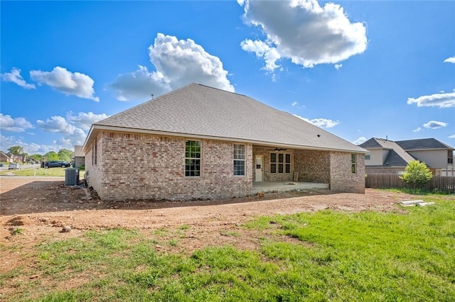 825 Baker St, Pea Ridge, AR 72751 - rear view of property with a patio, ceiling fan, fence, central AC unit, and brick siding