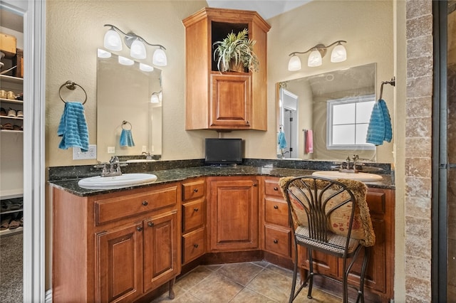 bathroom featuring vanity and tile patterned flooring