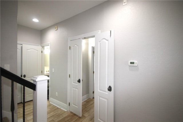 hallway featuring light hardwood / wood-style floors