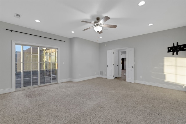 unfurnished room featuring carpet and ceiling fan