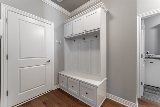 mudroom with dark hardwood / wood-style flooring and ornamental molding