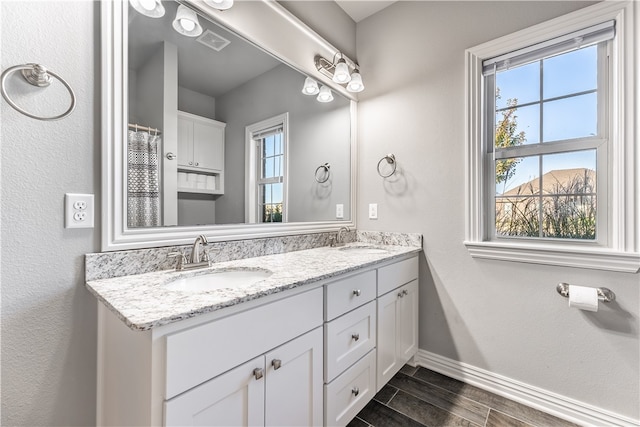 bathroom with vanity and a mountain view