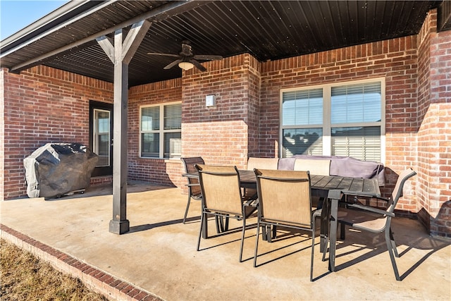 view of patio / terrace with area for grilling and ceiling fan