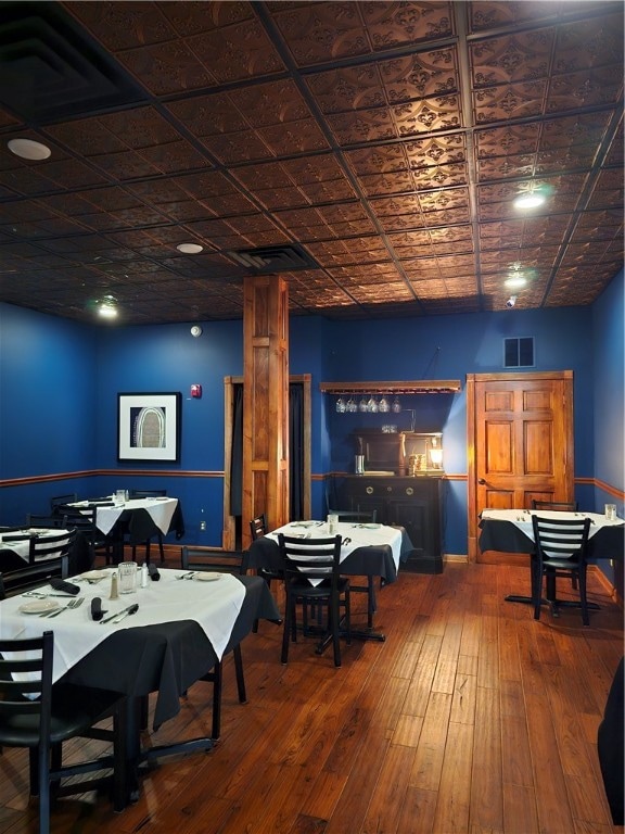 dining area featuring hardwood / wood-style floors