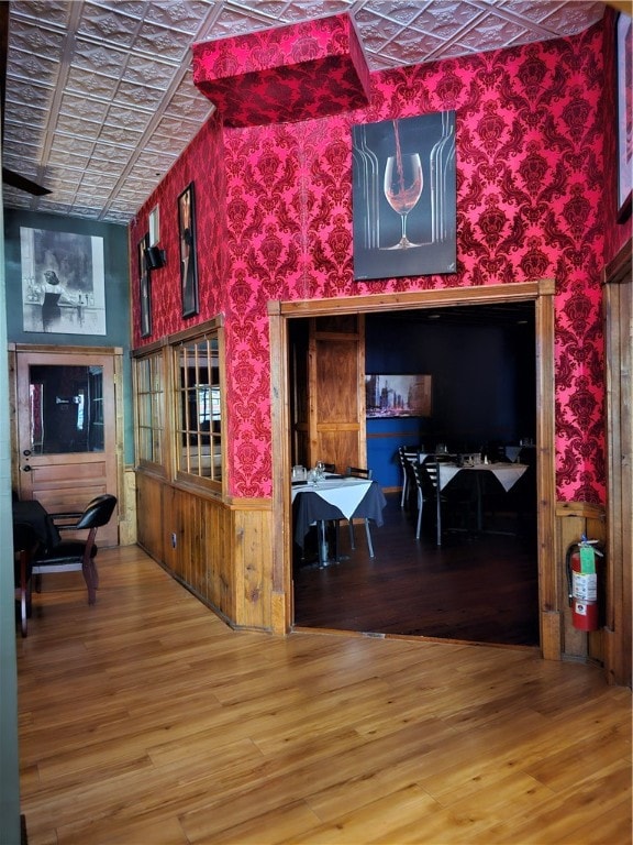 interior space with hardwood / wood-style floors and vaulted ceiling