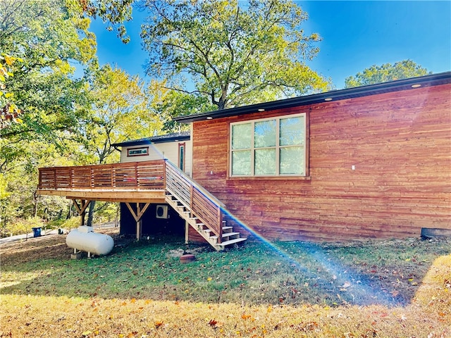 exterior space featuring a yard and a deck