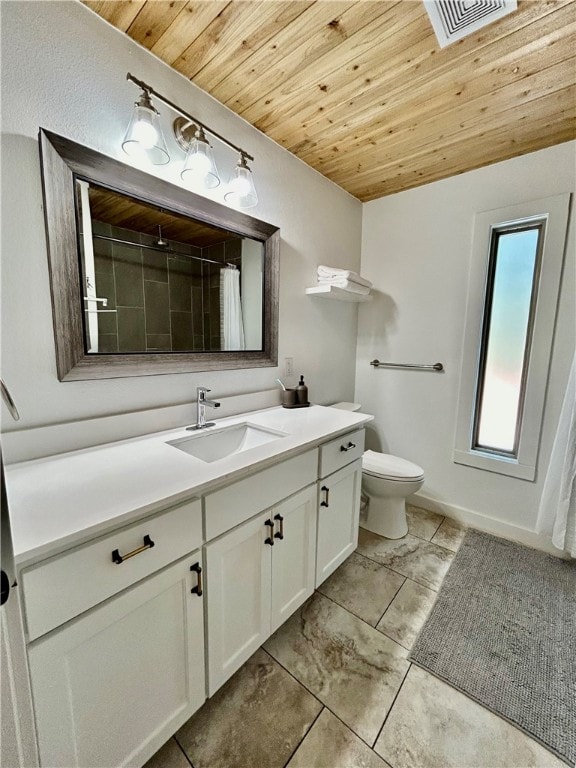 bathroom with curtained shower, toilet, wooden ceiling, vanity, and tile patterned flooring