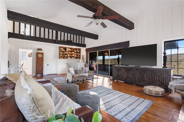 living room with beam ceiling, ceiling fan, high vaulted ceiling, and wood-type flooring