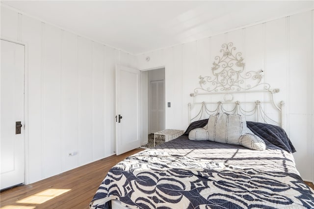 bedroom featuring wood-type flooring