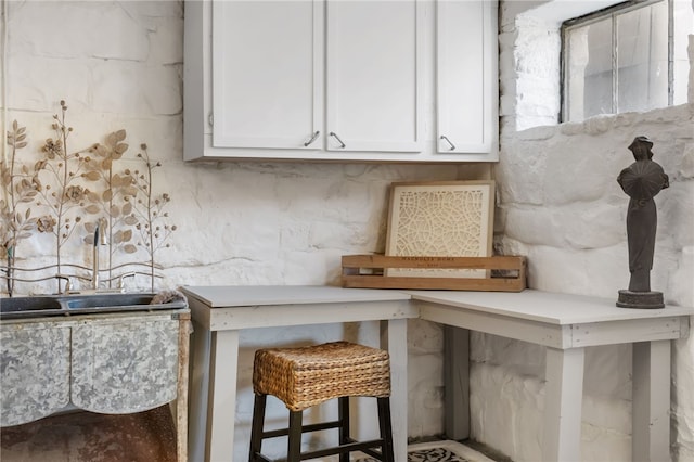 kitchen featuring white cabinets