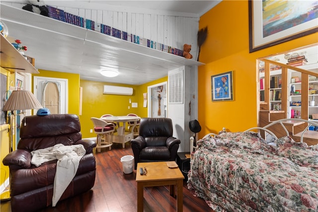 bedroom featuring dark hardwood / wood-style flooring and a wall mounted air conditioner