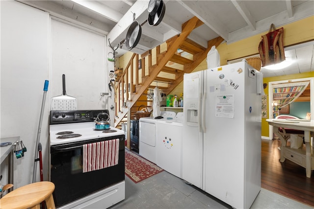 kitchen with white cabinetry, electric range, white refrigerator with ice dispenser, and washing machine and clothes dryer