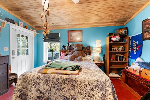 bedroom featuring wooden ceiling and concrete floors