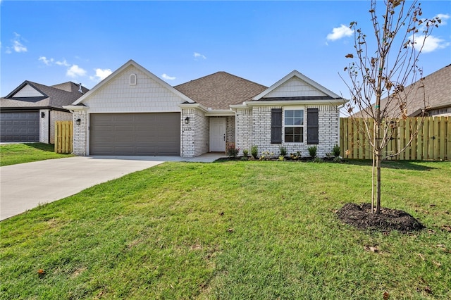 ranch-style home with a front yard and a garage