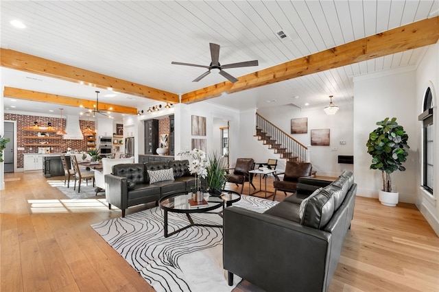 living room with beam ceiling, wooden ceiling, and light wood-type flooring