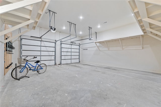 garage featuring a garage door opener