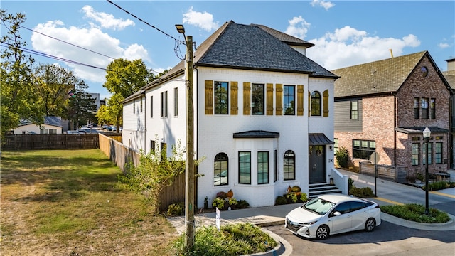 view of front of house with a front lawn