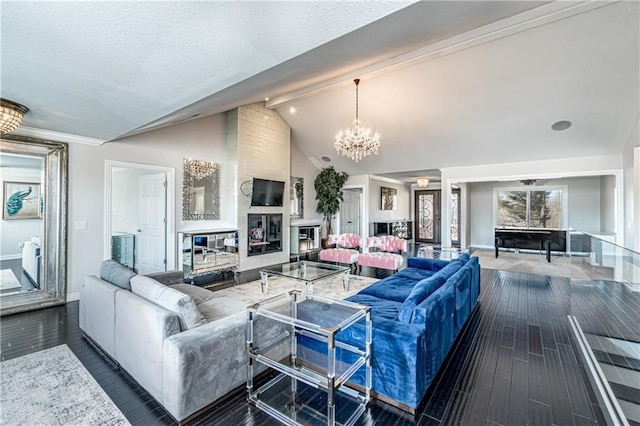 living room with high vaulted ceiling, a large fireplace, beamed ceiling, dark wood-type flooring, and a notable chandelier