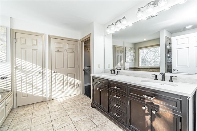 bathroom featuring vanity and tile patterned floors