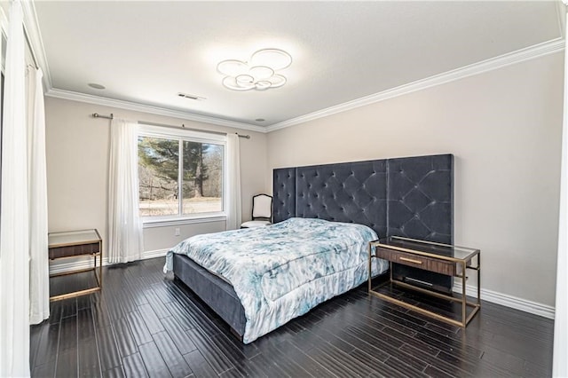 bedroom featuring ornamental molding and dark hardwood / wood-style flooring