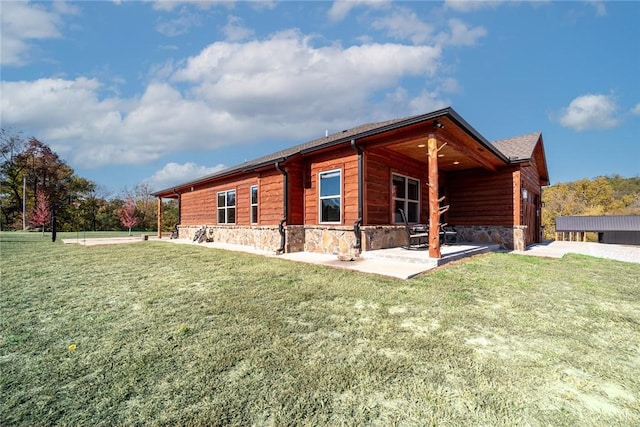 114 Ledgewood, Berryville, AR 72616 - view of front of property with stone siding, a patio area, and a front yard