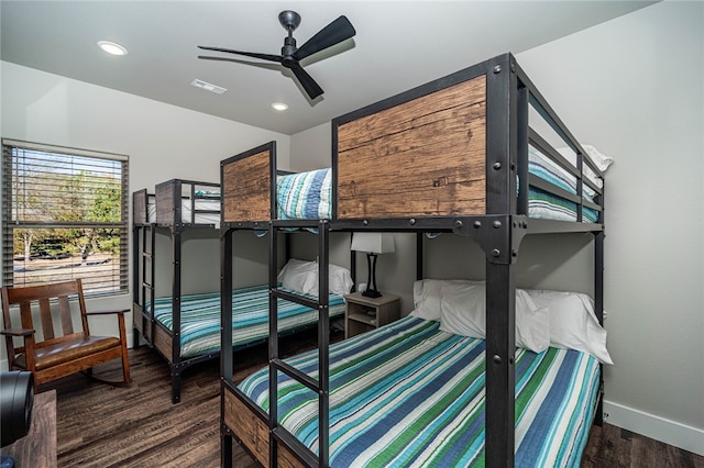 bedroom featuring ceiling fan and dark hardwood / wood-style flooring