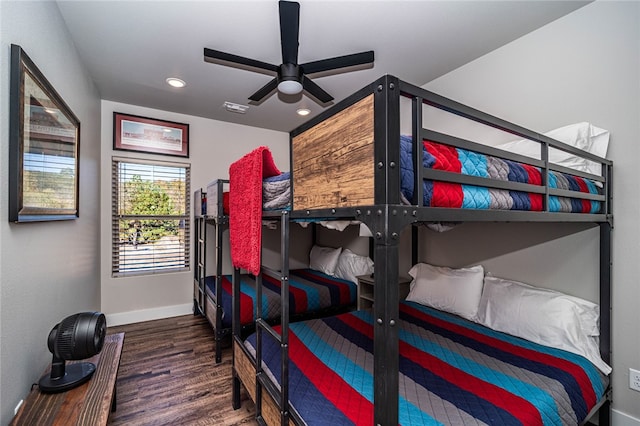 bedroom featuring dark wood-type flooring and ceiling fan