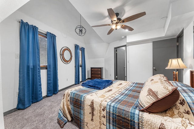 bedroom featuring lofted ceiling, carpet flooring, and ceiling fan