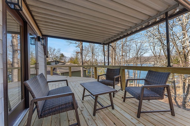 deck featuring a water view