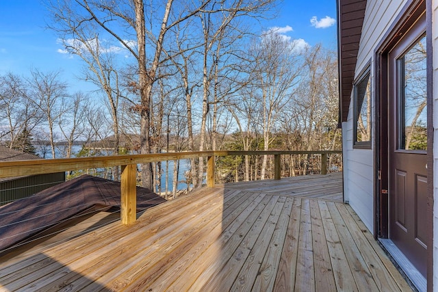 deck featuring a water view