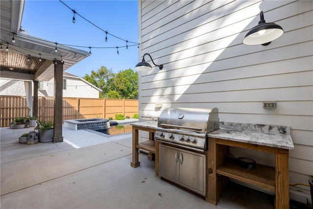 view of patio featuring grilling area