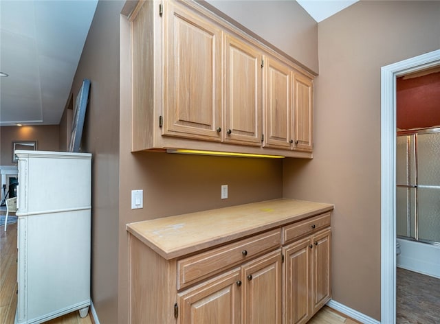 kitchen with light brown cabinets