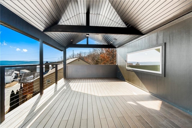 wooden deck featuring a water view