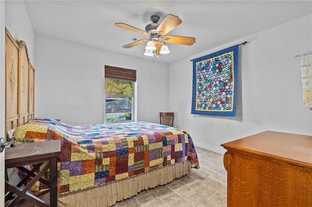 9299 W Forest Hills Dr, Fayetteville, AR 72704 - bedroom with a ceiling fan and baseboards