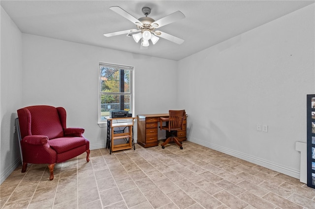 living area featuring ceiling fan