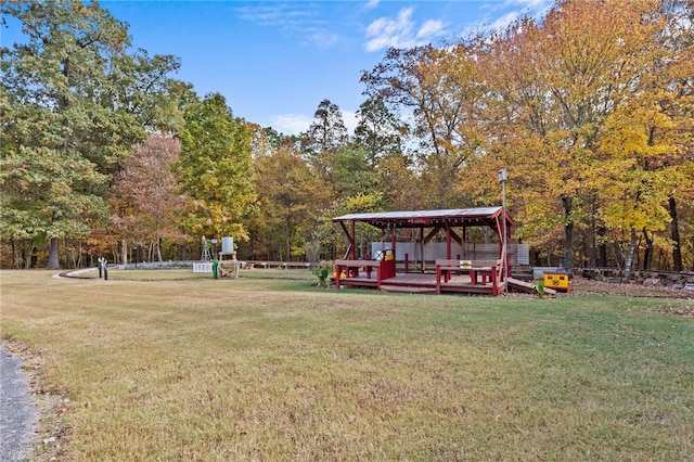 view of yard with a gazebo and a wooden deck