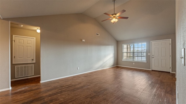 unfurnished living room with dark wood-type flooring, ceiling fan, and high vaulted ceiling